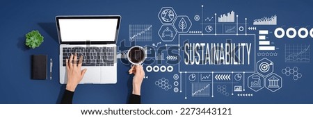 Sustainability theme with person using a laptop computer