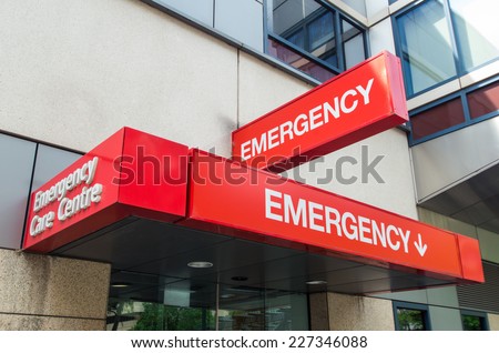 Entrance to and signage for a hospital emergency department in Melbourne, Australia Royalty-Free Stock Photo #227346088