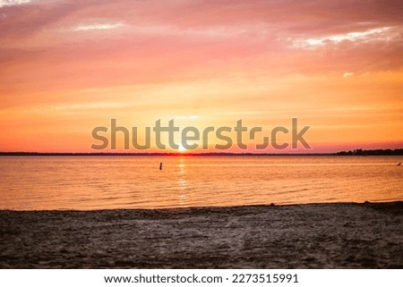 Dreamy orange sunset on the bay