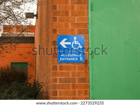 Handicap sign showing reserved street parking symbolizing disability and mobility problems showing accessibility and safety 