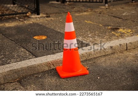 Orange construction traffic cone for road safety in the highway safety and caution