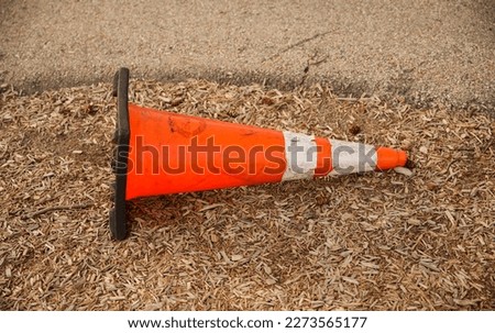 Orange construction traffic cone for road safety in the highway safety and caution Royalty-Free Stock Photo #2273565177