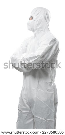 Worker wears medical protective suit or white coverall suit with mask and goggles fold arms isolated on white background Royalty-Free Stock Photo #2273580505