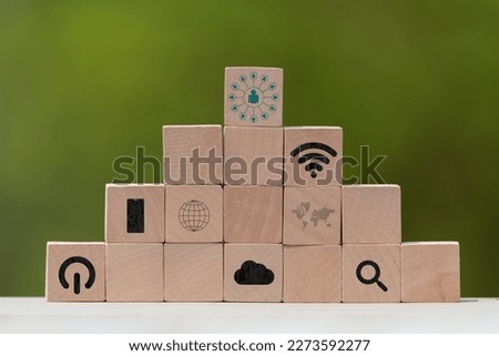 Digital concept icon on wooden block stack