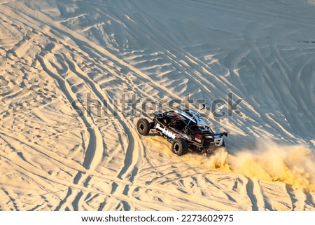 UTV, ATV, 4x4 off-road vehicle in sandy open area. Can-am in Qatar  Royalty-Free Stock Photo #2273602975