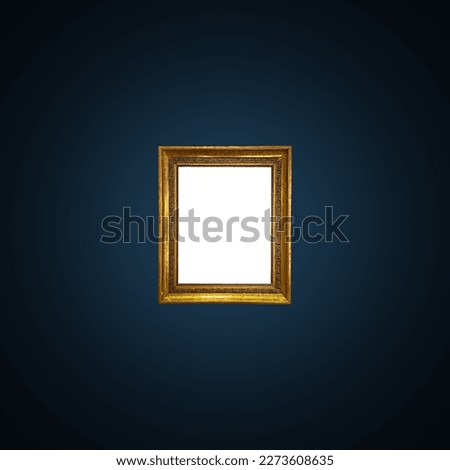 Antique art fair gallery frame on royal blue wall at auction house or museum exhibition, blank template with empty white copyspace for mockup design, artwork concept Royalty-Free Stock Photo #2273608635