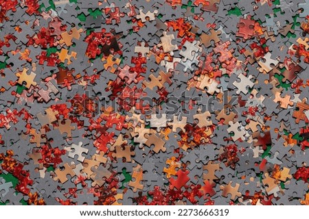 puzzle piece in red on a green background