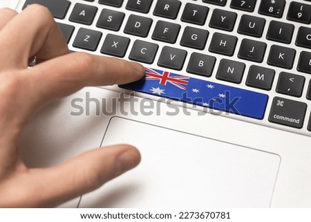A keyboard with a labeled button - Flag of Australia