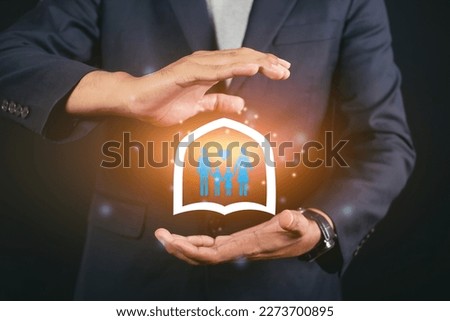 Businessman holding healthy family symbol. Family protection health insurance symbol and support to keep safe