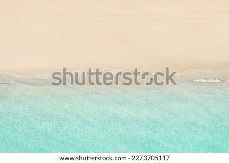 Top view of tropical Seychelles sand beach. Blue, turquoise transparent water surface of ocean, sea, lagoon. Horizontal background. Aerial, drone view Royalty-Free Stock Photo #2273705117