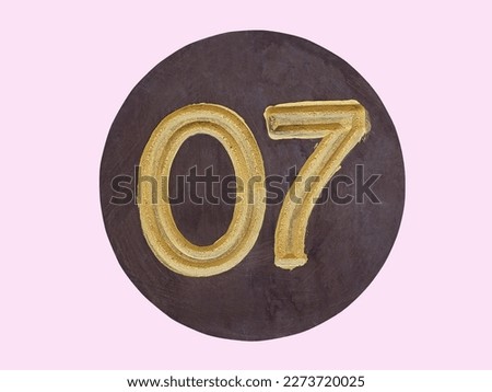 Golden number 07 isolated, pink color background photo format