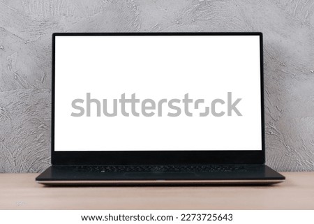 Photography of blank screen laptop with business concept and advertisement, and design element with copyspace