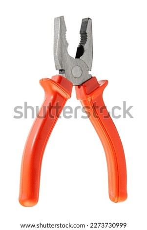 metal pliers with red rubber handles isolated on white background Royalty-Free Stock Photo #2273730999