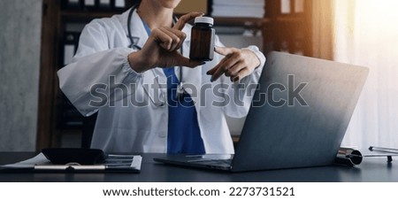 Male Doctor writing out RX prescription, copy space, consent contract sign prescribe a remedy healthy lifestyle healthcare Online medical service concept