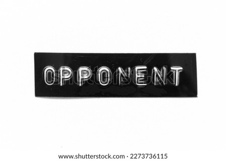 Black color banner that have embossed letter with word opponent on white paper background
