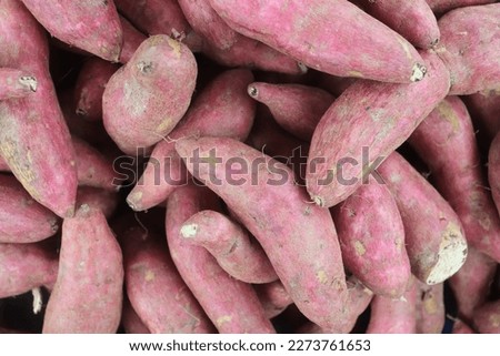 Full Frame Shot Of Sweet Potatoes For Sale At Market. for wallpaper texture pattern background  Royalty-Free Stock Photo #2273761653