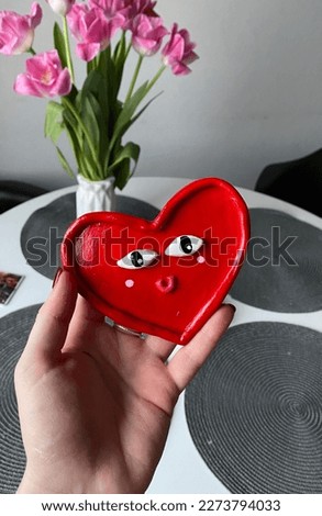 A handmade heart-shaped trinket dish from air dry clay Royalty-Free Stock Photo #2273794033