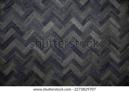 Dark wood texture. Seamless wooden wall with Modern chic abstract herringbone texture on black background. presentation design Dark base for websites, publications, bases for banners, wallpapers.