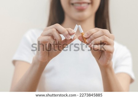 Quit, stop smoking, addiction asian young woman, girl refusing cigarette, smoker quitting smoke, hand in broken, break tobacco. Quit bad habit, health care concept. Willpower lifestyle of people.