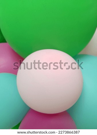 Balloons. White-green balloons. Greeting card. Festive background of balloons