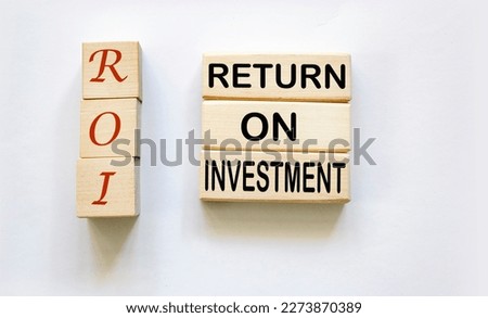 ROI abbreviation on wooden bars and white background. Return on investment