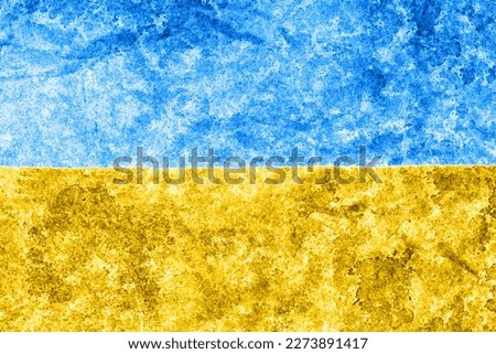 Ukrainian flag background. Grunge Flag of Ukraine texture. Paint on the wall. Blue and yellow color flag. Scratched metal pattern. Dirty war backdrop.