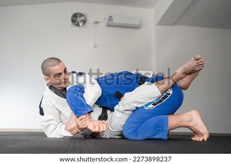 brazilian jiu jitsu bjj concept training martial arts combat sport Royalty-Free Stock Photo #2273898237