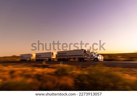 Road Train in the australian outback Royalty-Free Stock Photo #2273913057