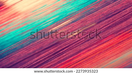 Multicolored straight strands texture background, sewing equipment, loom equipment at a garment factory Royalty-Free Stock Photo #2273935323