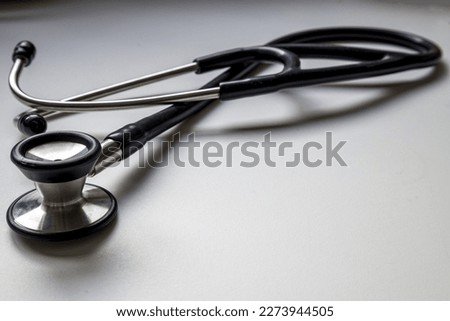 Black cardiology diagnostic stethoscope for doctor . Medical diagnostic tool on white background with copy space