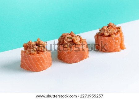 Fresh and Flavorful Nigiri Sushi with Tuna and Salmon Traditional Nigiri Sushi for Japanese Cuisine Enthusiasts Delicious Nigiri Sushi with Roe and Wasabi for a Perfect Bite