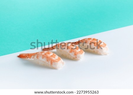 Fresh and Flavorful Nigiri Sushi with Tuna and Salmon Traditional Nigiri Sushi for Japanese Cuisine Enthusiasts Delicious Nigiri Sushi with Roe and Wasabi for a Perfect Bite