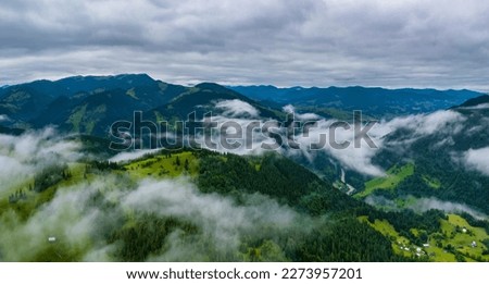 Peaceful scene of misty mountains. Location place of Carpathians mountains, Ukraine, Europe. Aerial photography, top view drone shot. Discover the beauty of earth. Royalty-Free Stock Photo #2273957201