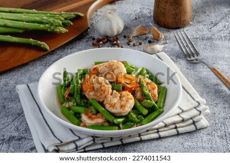 Asparagus stir fried with shrimp Royalty-Free Stock Photo #2274011543