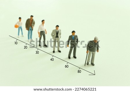 Concept image on age. Characters from young to old. Life cycle Royalty-Free Stock Photo #2274065221