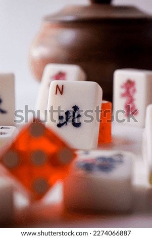mahjong chinese board game piece. Translation from chinese: "Nort"