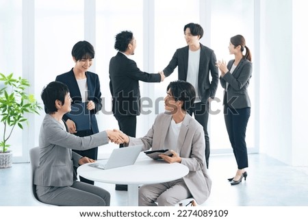 Group of businesspeople meeting in office. Teamwork of business. Royalty-Free Stock Photo #2274089109