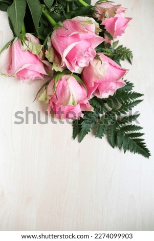 greeting card layout. bouquet of roses on a white background and space for text