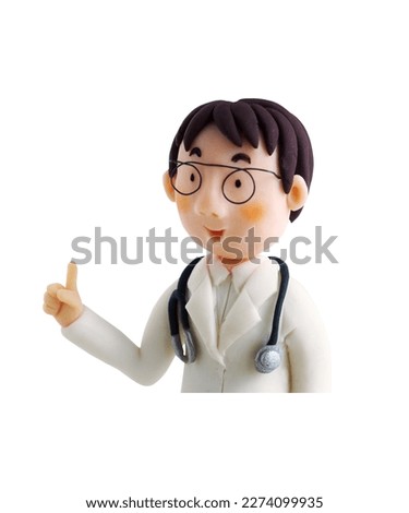 Upper half of the doctor explaining(This is a photo of a clay work)