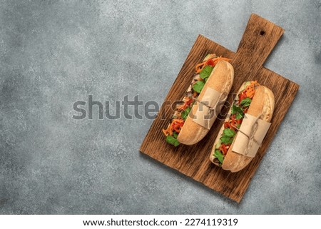 Banh mi, vietnamese sandwich. Top view, flat lay, copy space, selective focus. Royalty-Free Stock Photo #2274119319