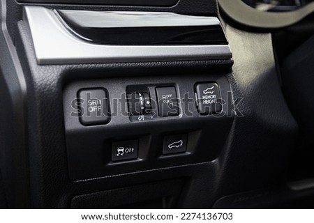 Control buttons for electronic systems safety in a modern car
