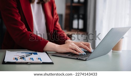Woman using on smartphone and tablet at home office as concept