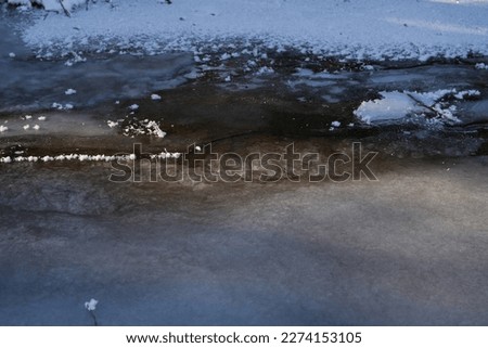 frozen river. winter landscape. photo during the day.