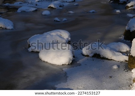 frozen river. winter landscape. photo during the day.