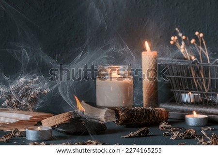 Tarot, astrology,Esoteric, Occult mystical ritual scene of sorcery tarot candles,dried flowers, palo santo tarot cards, ritual book.Witchcraft,mysticism and occultism,esoteric background,tarot banner Royalty-Free Stock Photo #2274165255