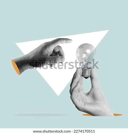 Creativity concept, business hands hold a lamp Royalty-Free Stock Photo #2274170511