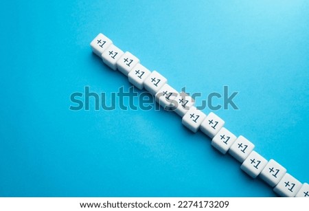 Growing line of blocks plus one. Sequence. Arithmetic progression. Sequential addition to the sum. Add one more. Increase and growth. A series concept. Accumulation process. Continuation Royalty-Free Stock Photo #2274173209