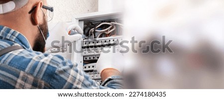 Electrician engineer worker test electric line