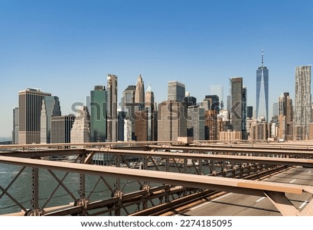 New York skyscrapers and Brooklyn bridge, office buildings at daylight, financial corporation. Manhattan skyline skyscrapers in the morning, one world trade center