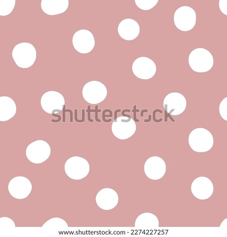 Seamless neutral polka dots pattern. White hand-drawn circles on dusty pink background. Abstract Random points ornament. Vector rose illustration for wallpaper, fabric, print, wrapping paper, textile Royalty-Free Stock Photo #2274227257